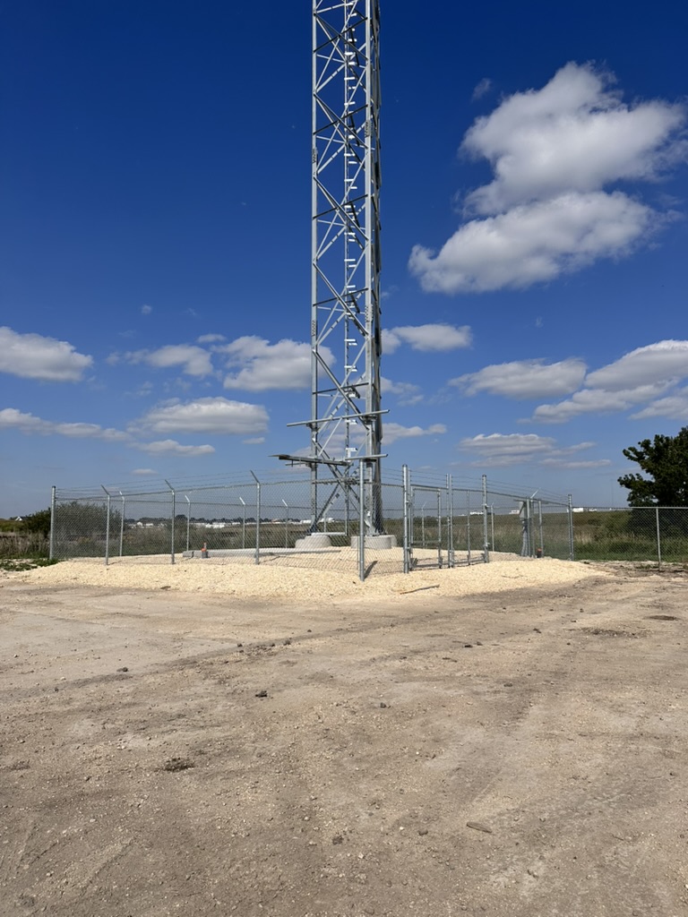Cell tower compound with chain link perimeter