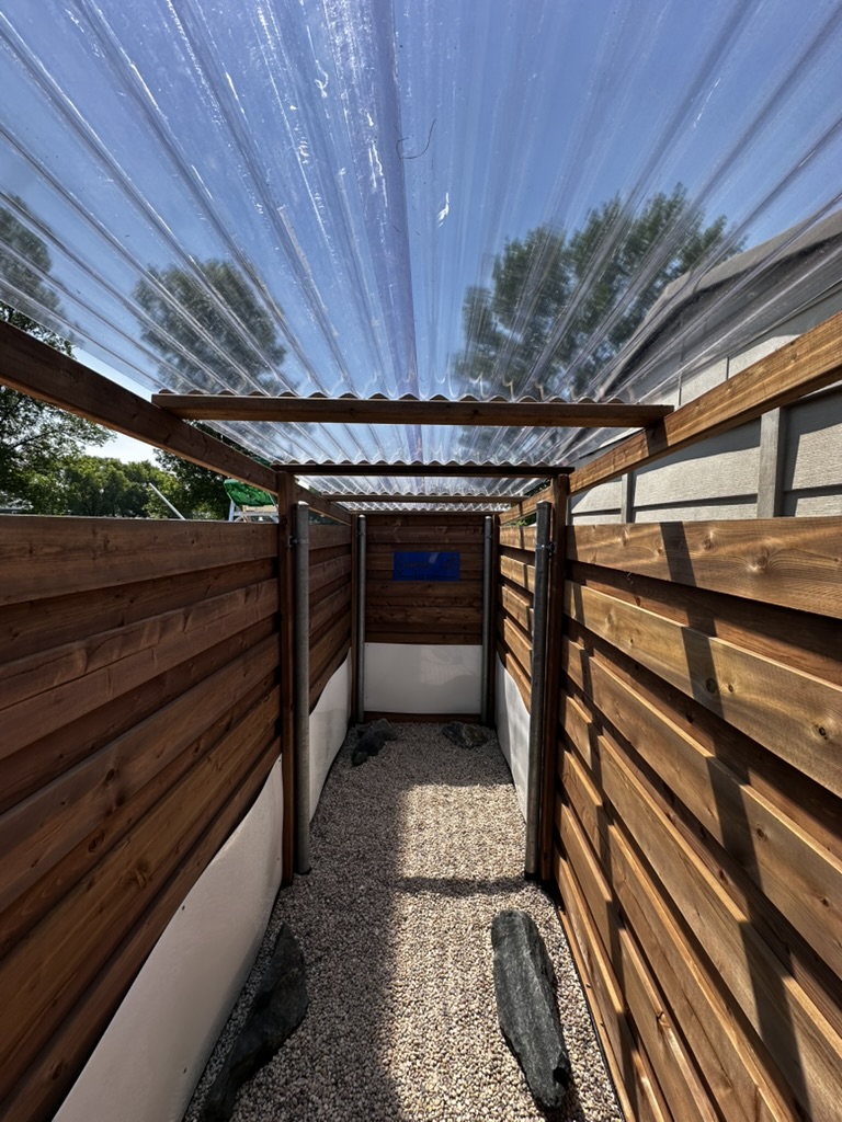 Custom wood hybrid garbage enclosure with roof